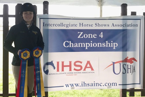 Adsit with her ribbons and the Zone 4 Championship banner