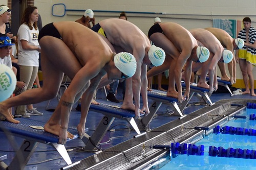 Men's swimmers ready for the start.